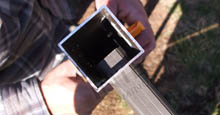 Lining Up Aluminum Fence Posts During Installation Of Panels of Fencing